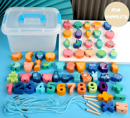 Toddler actively engaged in a lacing beads educational toy, developing hand-eye coordination and fine motor skills.