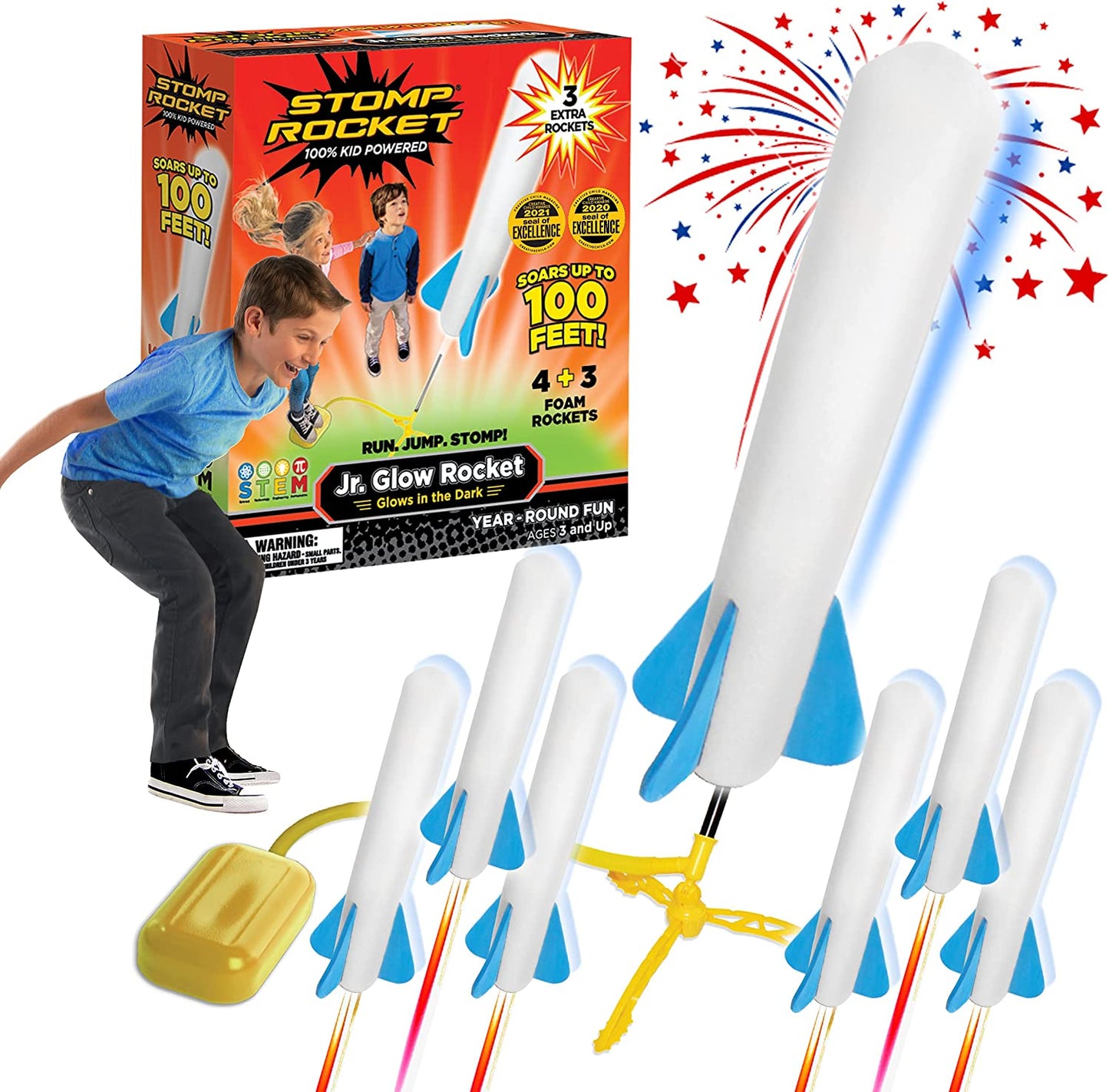 Kids launching a red foam rocket from a green Air Power Rocket Launcher toy set outdoors