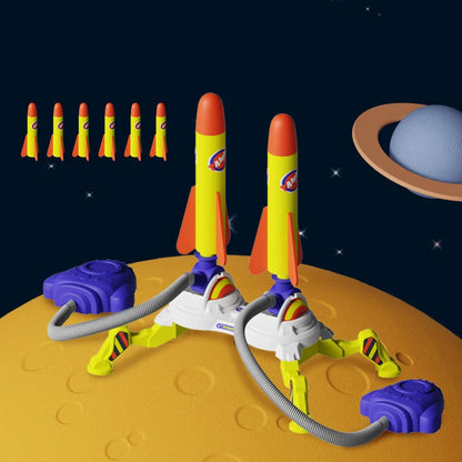 Action shot: a LED rocket launched from a jump pad, mid-flight over a green lawn, kids' toy