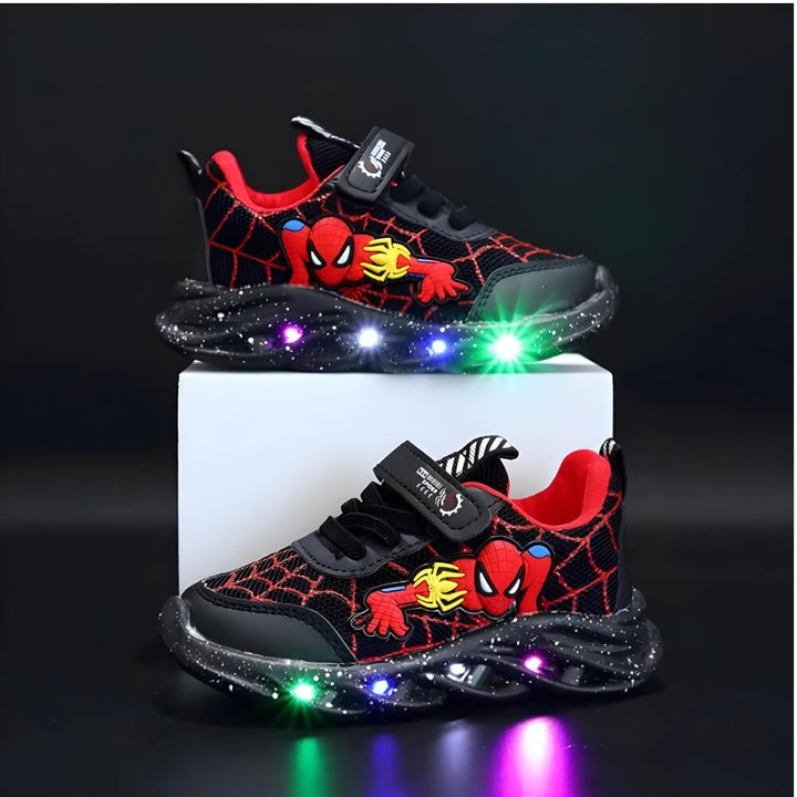 Red kids' LED light-up sneakers with velcro closure for active play and children's footwear.