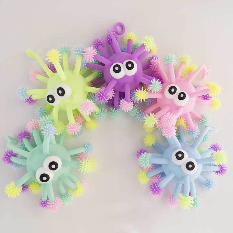 Collection of glowing light-up sensory squeeze balls for kids, great for playtime & sensory input