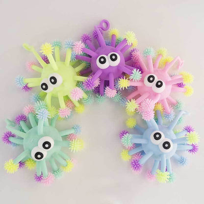 Collection of glowing light-up sensory squeeze balls for kids, great for playtime & sensory input