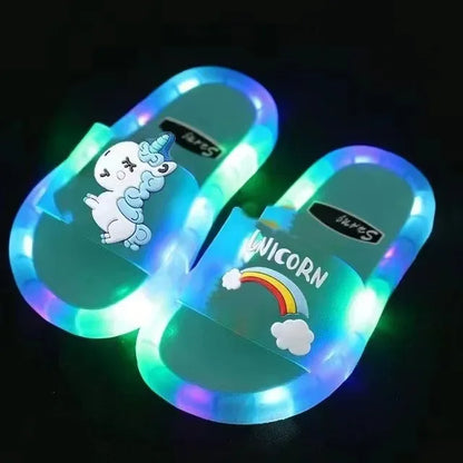 Two light-up unicorn slippers, ready for playtime and cozy relaxation for toddlers