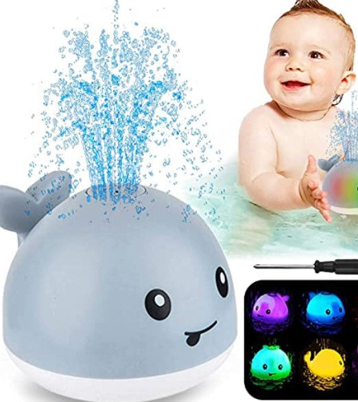 Unisex LED whale bath toy with water spray, engaging for early development