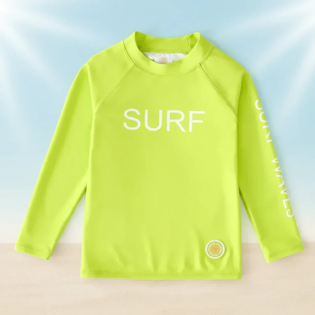 Pink long-sleeve rash guard for kids, UPF 50+ sun protection, comfortable beachwear.