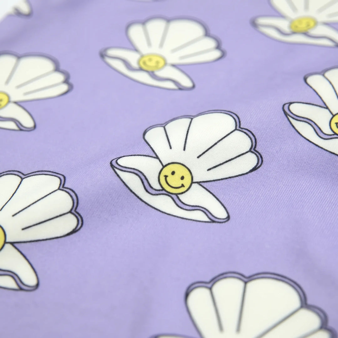 Children's long-sleeved sun protective swimsuit, perfect for beach adventures & pool play.