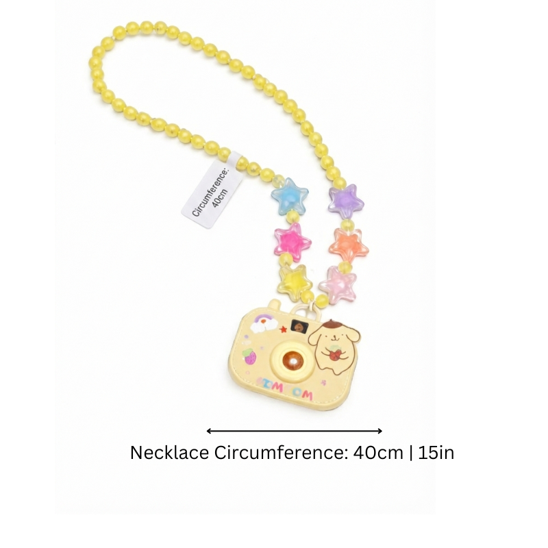 Close-up of Kids' Magical Camera Projector Necklace, showing lens and buttons, children's accessory