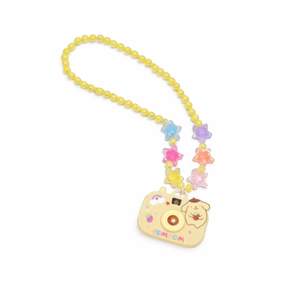 Child playing with blue Kids' Magical Camera Projector Necklace, projecting an image, creative toy