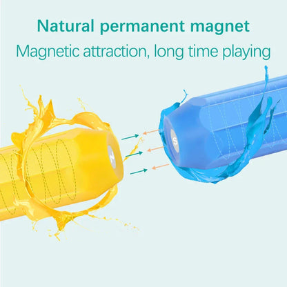 Child holding a completed magnetic digger vehicle, enjoying a building blocks construction set