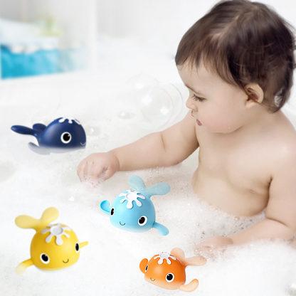 Toddler playing with Magnetic Fishing Bath Toy Set, catching a yellow fish in bathtub, for developmental water play.
