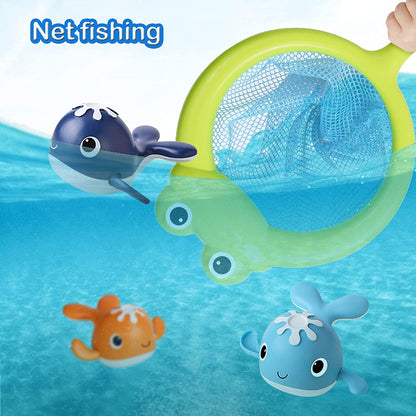 Close-up of a child's hand holding fishing rod with magnetic hook, about to catch a magnetic fish bath toy.
