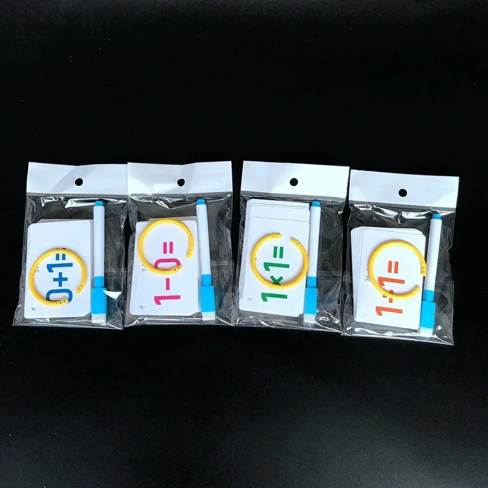 Child's hand holding a math learning flash card, a tool for early arithmetic and educational play