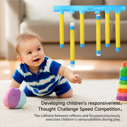 Children playing the Stick Grab reaction speed game, enhancing agility and coordination with colorful sticks.