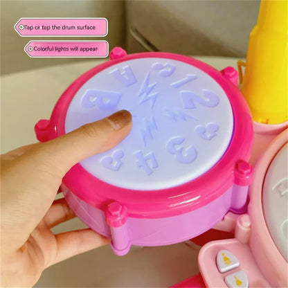 Close-up of Kids Musical Drum Kit, showing drums, cymbals, and microphone toy with colorful lights