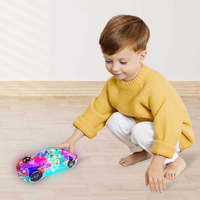 Transparent gear toy car with flashing lights and music, a 'bump and go' activity toy for children's gifts.