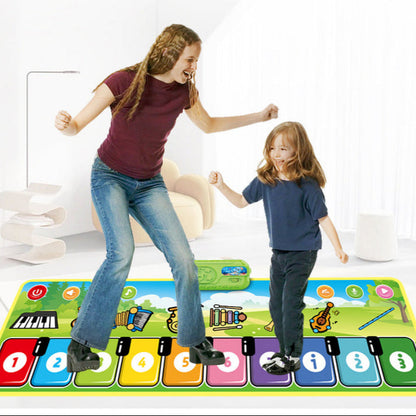 Toddler playing on a large musical piano play mat, enhancing coordination and balance skills