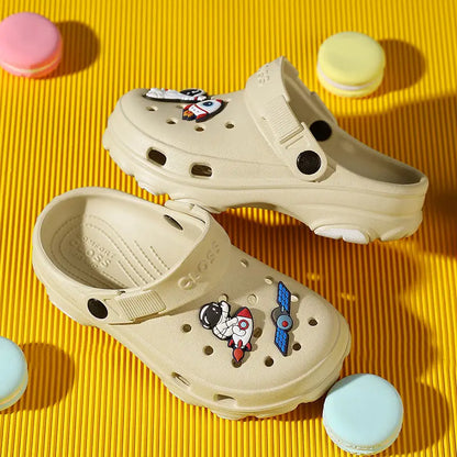 Toddler non-slip clogs with durable PVC upper, perfect summer playtime footwear.