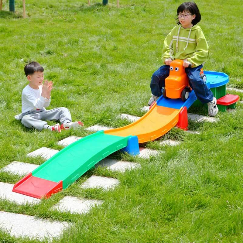 Kids outdoor backyard roller coaster ride-on toy, vibrant plastic track and red car, children's activity fun