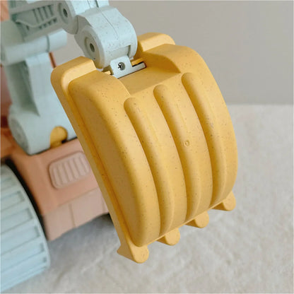 Children's bulldozer toy, part of an outdoor construction vehicle set, perfect for imaginative play.