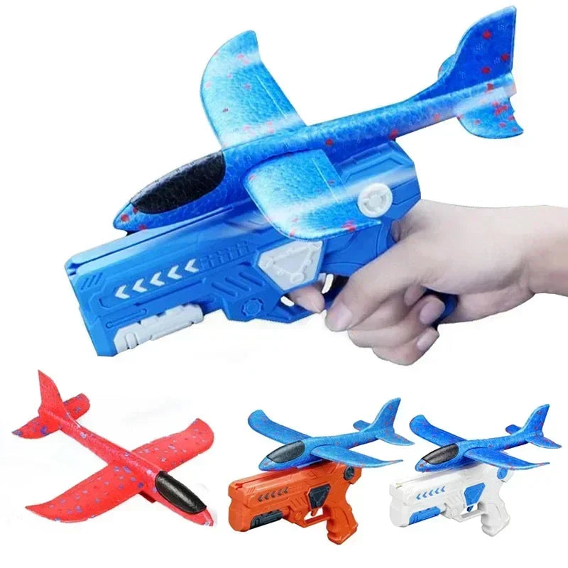 Child launching a foam plane with a launcher toy, enjoying outdoor family fun