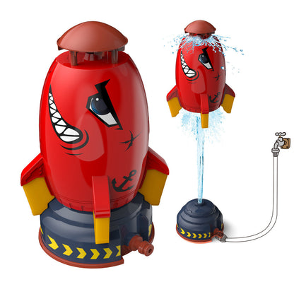 Toddler playing with a vibrant Kids' Water Rocket Sprinkler Toy in a green backyard, splashing water