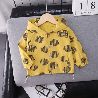 Unisex kids' hooded jacket featuring a criss-cross pattern, made from soft cotton.
