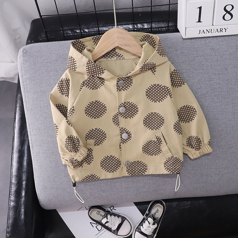 Close-up of the criss-cross pattern on a kids' soft cotton hooded jacket.