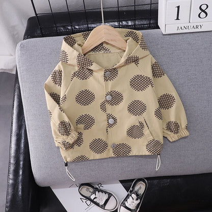 Close-up of the criss-cross pattern on a kids' soft cotton hooded jacket.