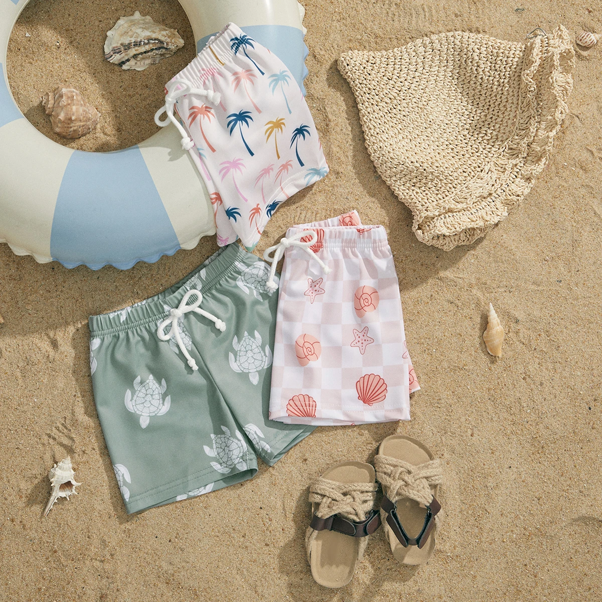 Pair of kids' patterned swim trunks, elastic waist, suitable for boys and girls swimwear.