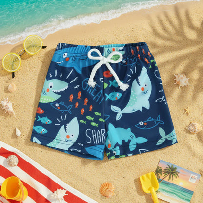 Assortment of kids' patterned swim trunks in various sizes, toddler to youth, swimwear collection.