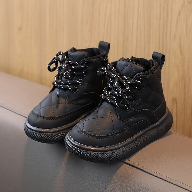 Children's winter boots with plaid design, providing warmth and traction for snowy days, comfy shoes