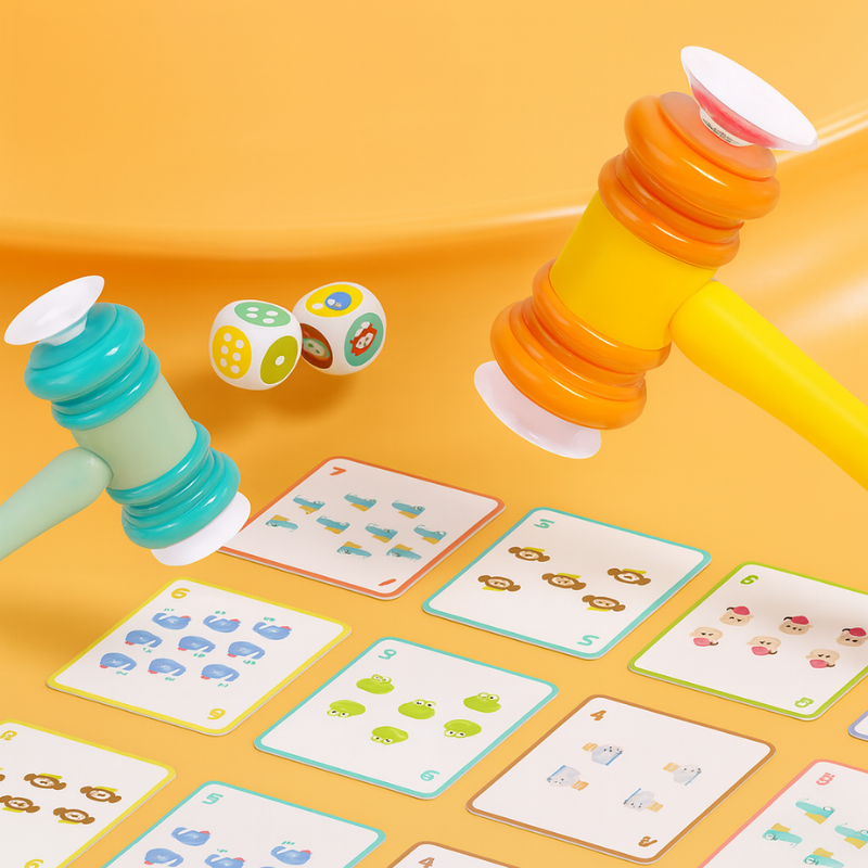 Kids playing educational math game with dice and toy hammers, developing number skills