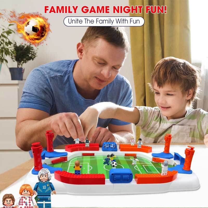 Detailed view of a kid's tabletop soccer game, showing score trackers and robust construction