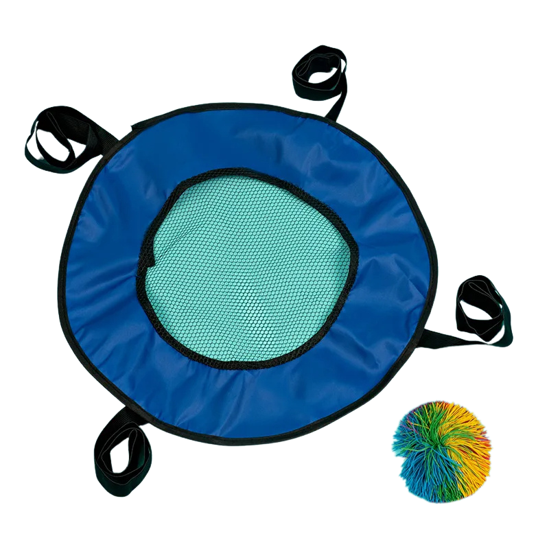 Close-up of a child's hand gripping an elastic paddle with a soft ball mid-air during a kids' toss and catch game.