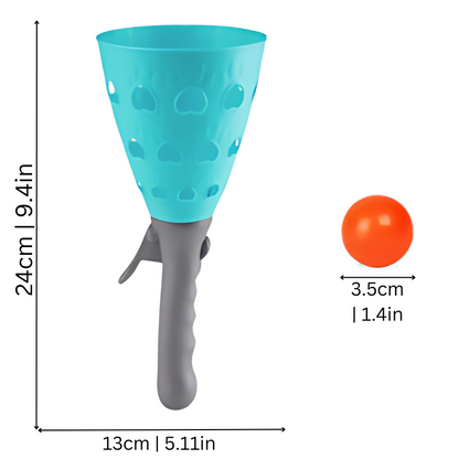 Close-up of green and blue Pop & Catch game set for kids, enhancing hand-eye coordination