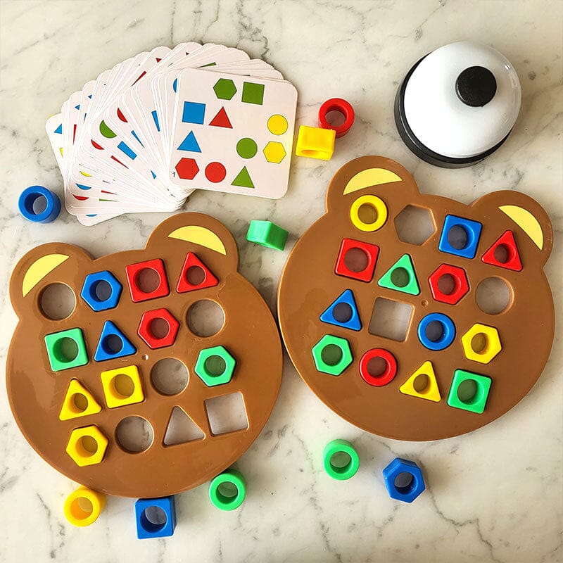 Kids playing 'Shape Matching Strategy Game' for cognitive development, an interactive educational toy