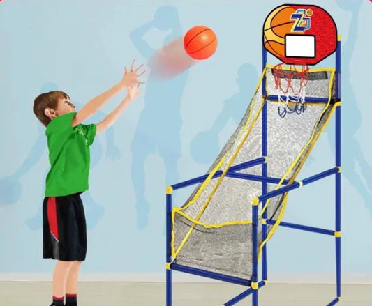 Kids playing two-player indoor basketball arcade game, a fun sports toy for active play.