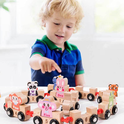 Kids playing with a colorful wooden educational train toy set on a blue mat, learning shapes and colors.