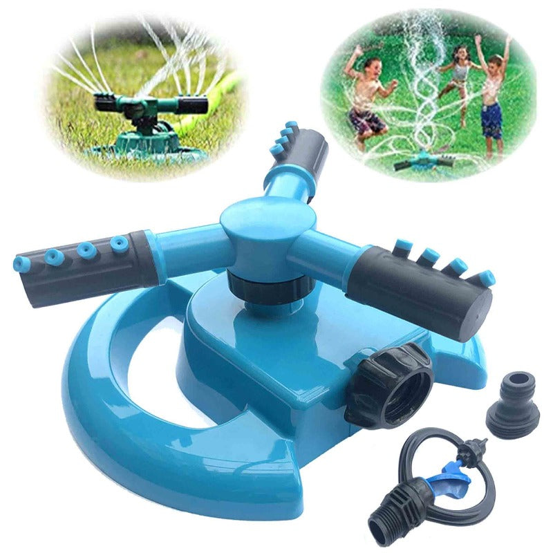 Kids playing with a vibrant flower-shaped water sprinkler toy in a sunny green yard.