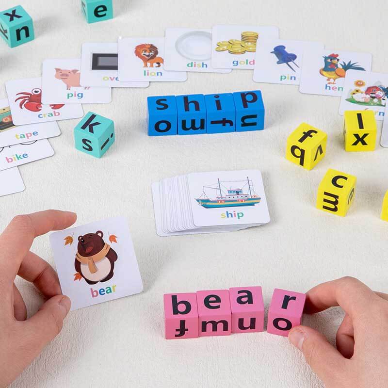 Close-up of child's hands arranging wooden letter blocks for spelling