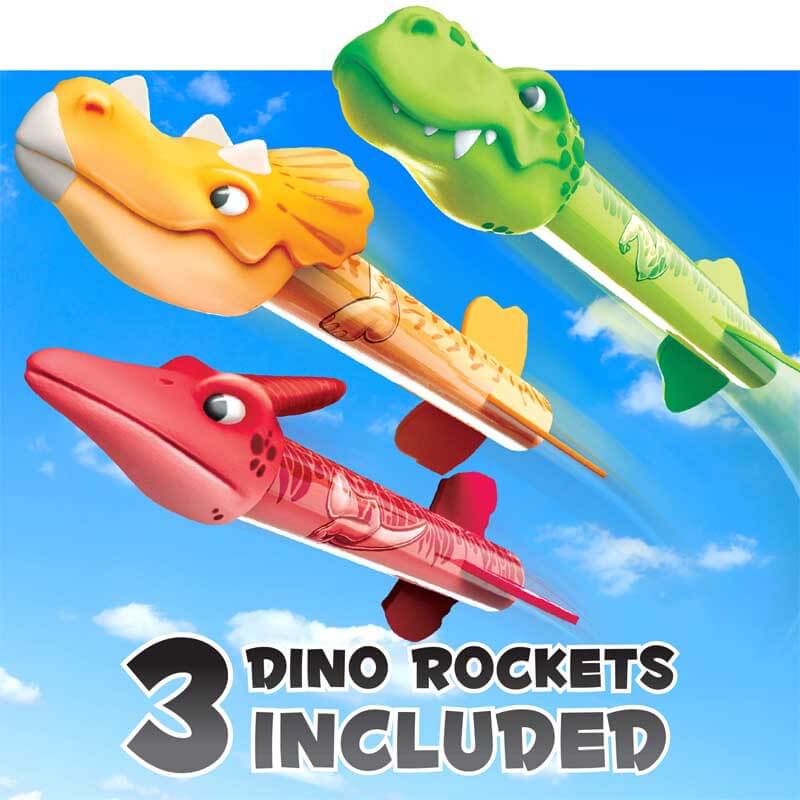 Colorful foam rockets flying from a dinosaur-themed launcher, perfect for outdoor STEM activity.