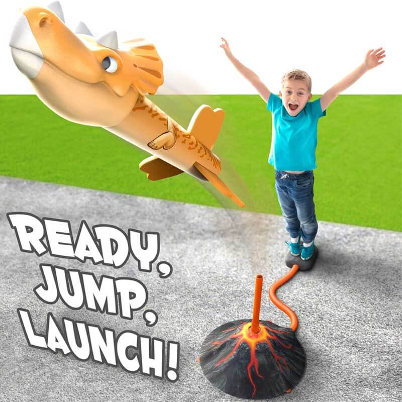 Dinosaur Rocket Launcher Toy set with a large green dinosaur base, stomp pad, and multiple foam rockets.