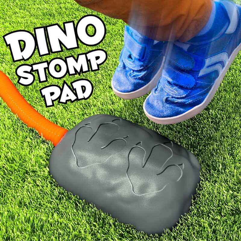 Child laughing while launching a foam rocket with the Dinosaur Rocket Launcher Toy, ideal for active kids.