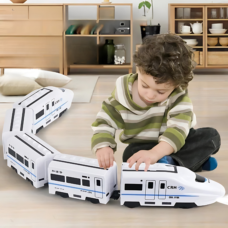 Kids playing with interactive electric train toy, colorful with flashing lights and sounds