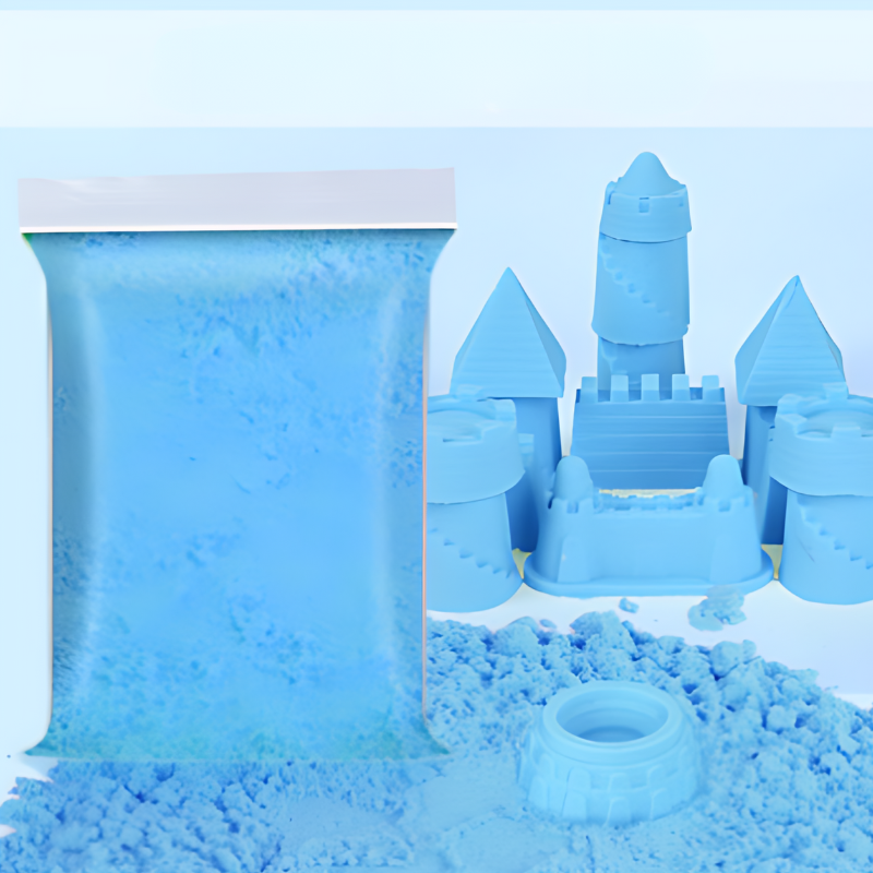 Close-up of child's hands shaping vibrant educational Magic Sand with molds, promoting creativity & indoor activity.