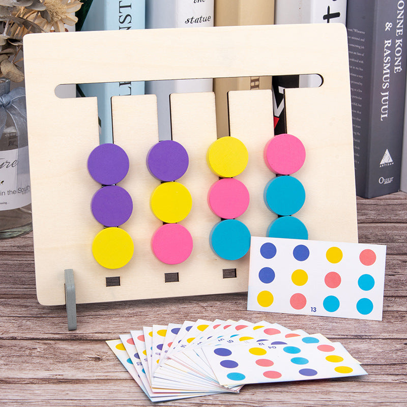 Colorful wooden pegs and dice from a Kids Wooden Memory Four-Color Chess game.