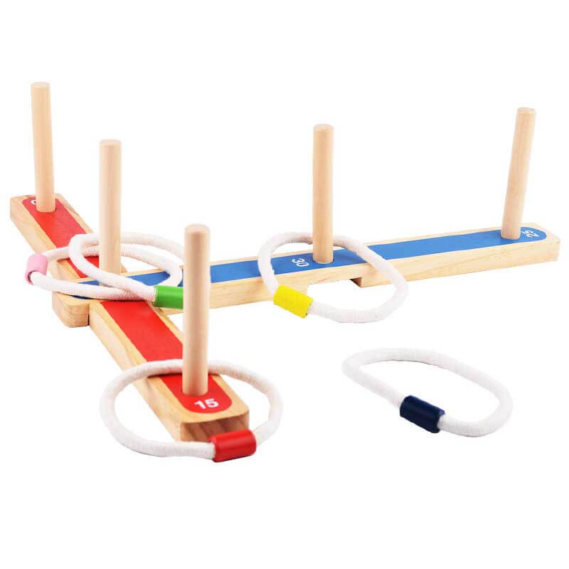 Durable wooden ring toss game with bright rings on grass, promoting child development & entertainment