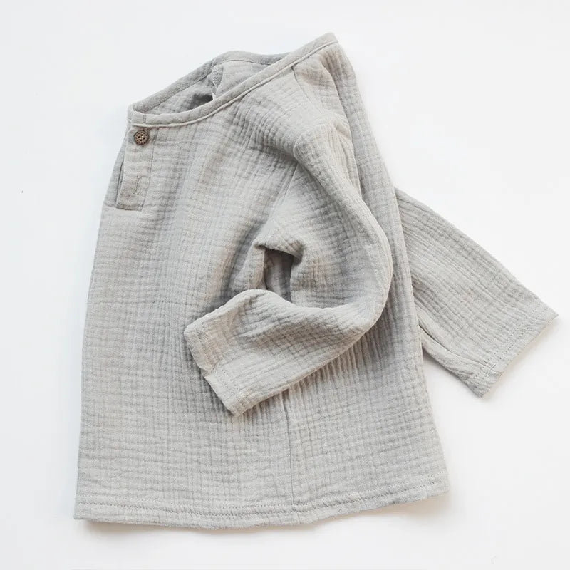 Toddler running in a flexible pleated linen & cotton blend t-shirt, casual kids apparel