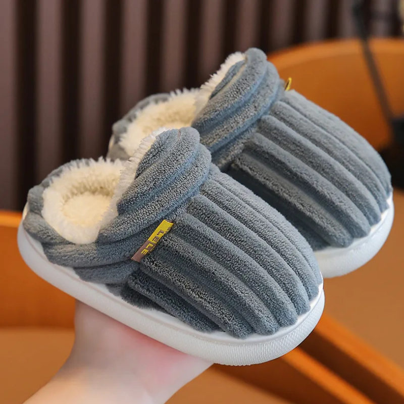 Kids' plush winter slippers, anti-slip soles, cozy indoor shoes for warm feet.