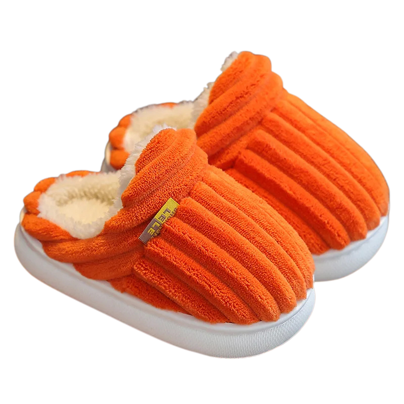 Cozy kids' winter slippers, anti-slip plush footwear for secure and warm indoor comfort.